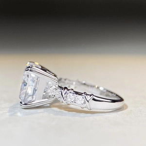 Elegant S925 silver criss-cross ring with square-cut zircon and pavé diamond band