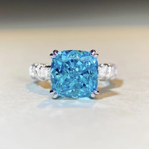 Luxurious S925 silver ring featuring a large cushion-cut light blue aquamarine stone