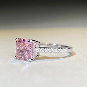 S925 silver ring featuring a large pink radiant-cut gemstone and pavé-set diamonds