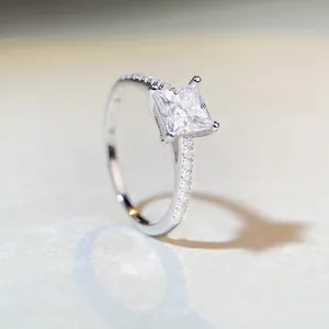 Square cut moissanite engagement ring in 925 silver with pavé-set diamond band
