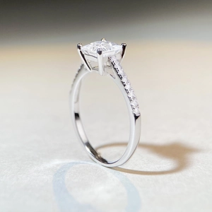 925 silver princess cut square moissanite ring with four-prong setting and pavé shank