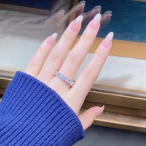 On-hand view of elegant 925 silver ring featuring sparkling baguette-cut cubic zirconia stones