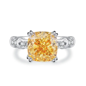 Anello incrociato in argento S925 con gemma gialla taglio cushion e zirconi