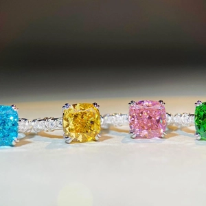 Set of four cushion-cut silver rings with colorful square carbon diamonds and pavé accents