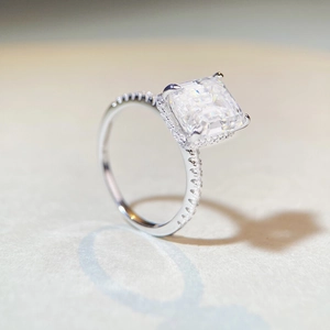 Elegant emerald cut moissanite ring in 925 silver with halo setting and micro pavé diamonds