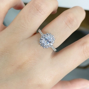 Classic S925 sterling silver halo ring featuring an oval-cut 1 carat moissanite gemstone