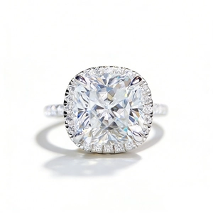 5 carat cushion cut moissanite ring with halo setting and pave band in sterling silver