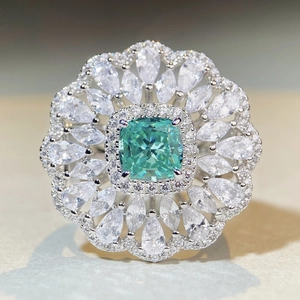 Exquisite flower-shaped S925 silver cocktail ring with green gemstone and white zircon