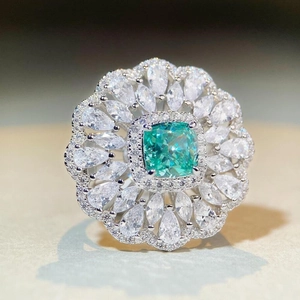 Luxurious S925 silver flower ring with cushion-cut paraiba green stone and white zircons