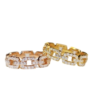Anelli a catena in argento 925 con pavé di zirconi, finiture oro giallo e rosa 18K
