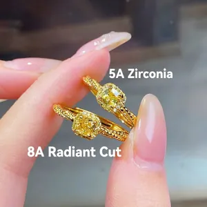 Elegant gold-plated silver ring featuring yellow radiant cut zirconia and twisted band