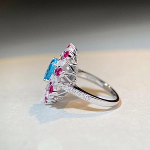 Luxurious 925 silver ring with sea blue center stone and pink zircon floral accents