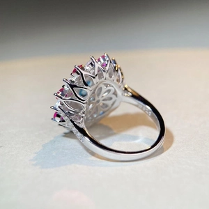 925 silver sunflower ring featuring light blue oval gemstone and pink zircon accents