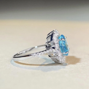 S925 silver ring with large oval aquamarine center stone and pave-set diamond accents