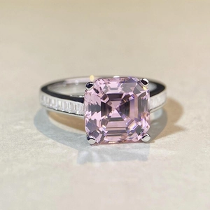 Macro shot of Asscher cut pink diamond ring with S925 sterling silver stepped band details