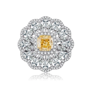 Luxurious 925 silver ring featuring a yellow cushion-cut center stone and floral diamond halo