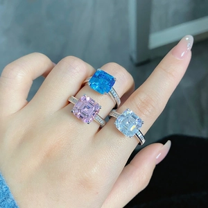 Detailed close-up of S925 silver rings with square cut pink blue and white zircon gems