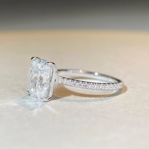 4-carat radiant cut moissanite ring in 925 sterling silver with pavé-set side stones