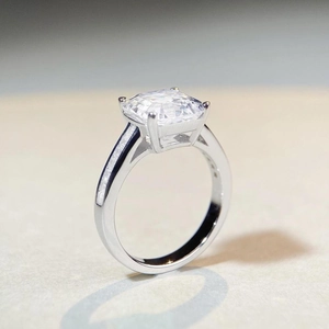 Luxurious S925 sterling silver ring with square-cut gemstone and side pave diamonds