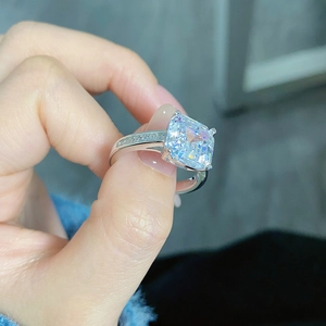 Macro shot of S925 sterling silver ring with large square cut stone and channel setting