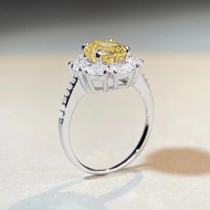Luxurious S925 silver halo ring with cushion cut yellow diamond and floral pavé accents