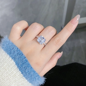 Macro shot of Asscher cut high carbon diamond ring on hand with thick S925 silver band