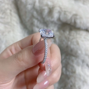 Detail view of a 4-carat radiant cut stone on a 925 sterling silver ring band