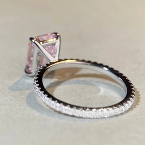 Elegant S925 silver ring featuring emerald cut pink gemstone with pave zircon stones