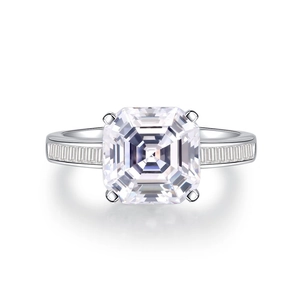 Classic S925 silver ring featuring a square Asscher cut diamond with baguette side stones