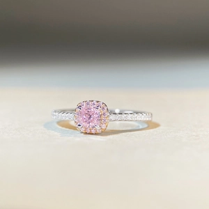 Elegant S925 sterling silver ring with pink cushion cut stone and pave diamond band