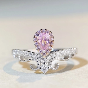 Luxurious S925 sterling silver crown ring featuring a pear-cut pink zircon and pavé crystals