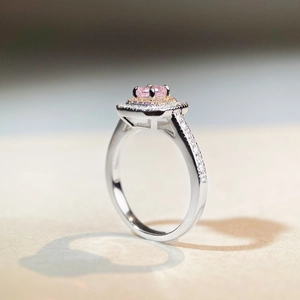 Elegant S925 silver ring featuring a pink oval gemstone with double halo diamond setting