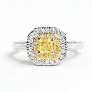 Luxurious S925 silver ring featuring a yellow cushion-cut diamond with halo pavé setting