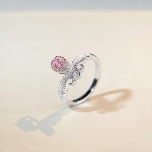 Pear shape pink diamond ring in S925 silver with a wavy pavé set zircon band
