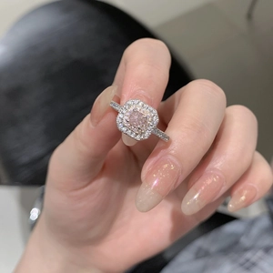 Detailed macro view of S925 silver square pink diamond ring with double halo setting