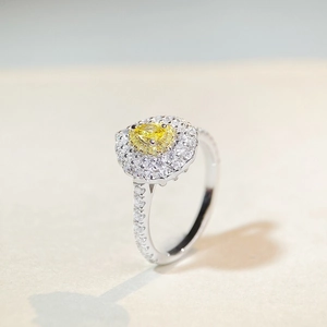 Luxury 925 sterling silver ring with pear-cut yellow zircon and sparkling halo setting