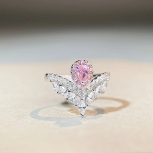 Elegant S925 silver V-shaped ring with pink pear-shaped gemstone and marquise accents
