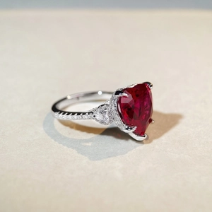 Elegant S925 sterling silver ring with heart-cut ruby stone and small side diamonds