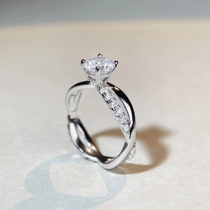 Classic 1-carat moissanite ring with twisted pavé band in polished sterling silver
