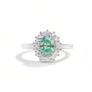 Classic 925 sterling silver ring with oval green moissanite halo and pavé band