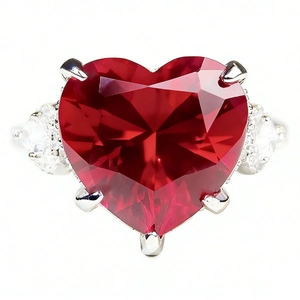 Exquisite S925 silver ring featuring a heart-shaped pigeon blood red gemstone with side diamonds