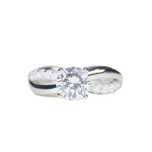 Classic one carat moissanite four-prong twisted band ring in silver polished finish