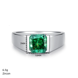 Macro shot of 7x10mm emerald cut green zircon on a polished silver band