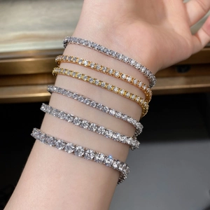 Detailed comparison of 925 sterling silver and gold tennis bracelets with various stone sizes