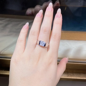 Close-up of a wide silver ring for men featuring a 3-carat cushion-cut cubic zirconia stone