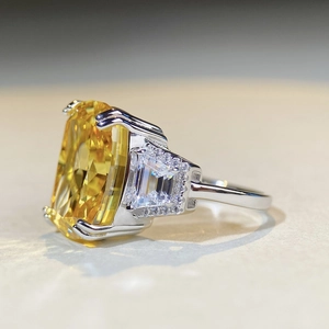 Luxurious S925 sterling silver ring with large radiant cut yellow diamond and side stones