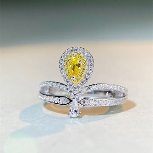 Luxury crown-shaped S925 silver ring with a pear-cut yellow zircon and diamond accents