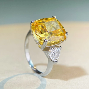 Luxurious S925 silver ring featuring a large cushion-cut yellow carbon diamond and side stone