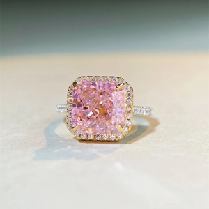Elegant S925 silver halo ring featuring a large princess cut pink stone with pavé diamonds