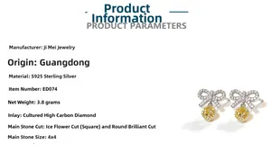 Detail of S925 sterling silver bow earrings with radiant cut yellow carbon diamonds